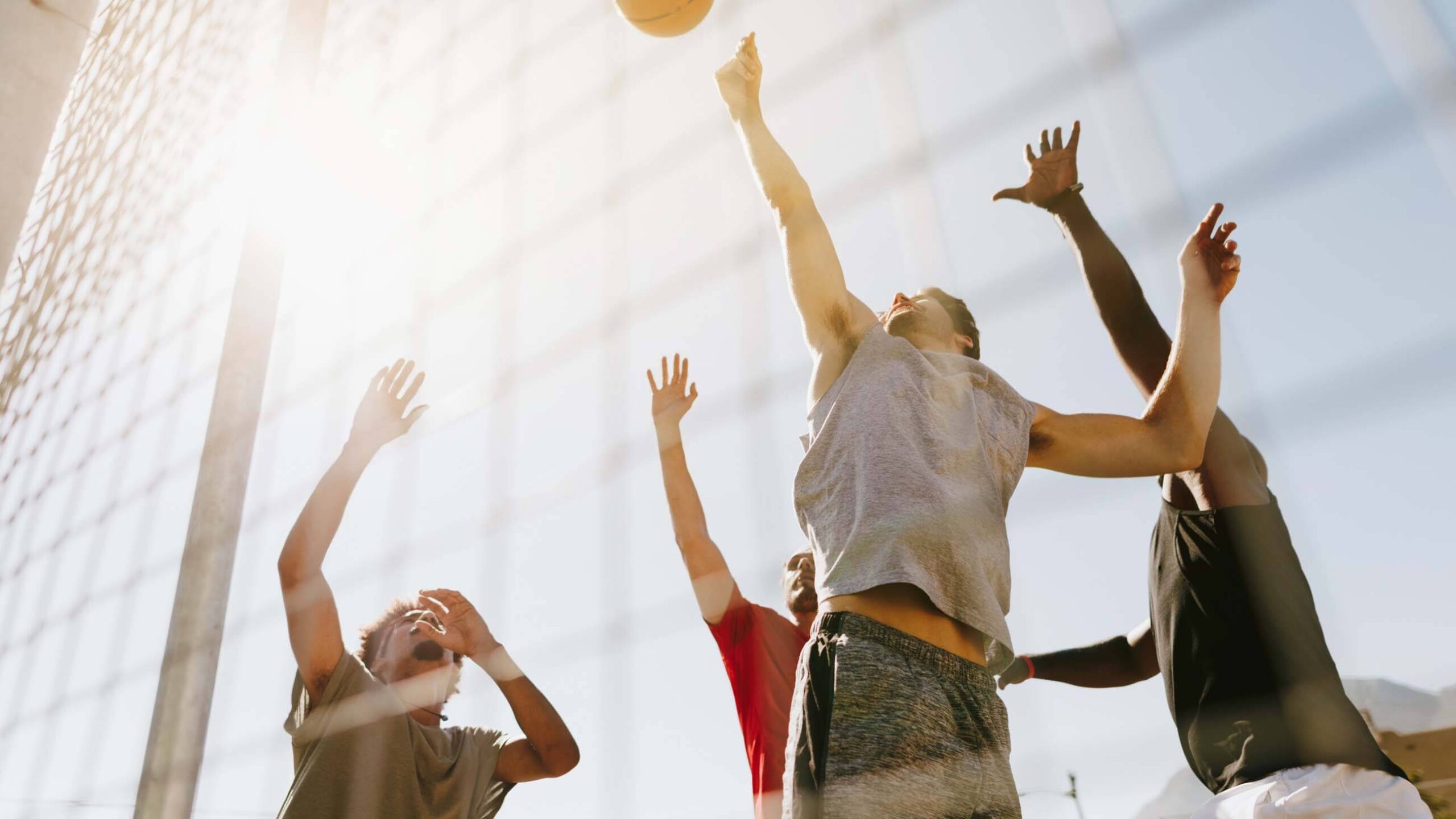 men playing basketball