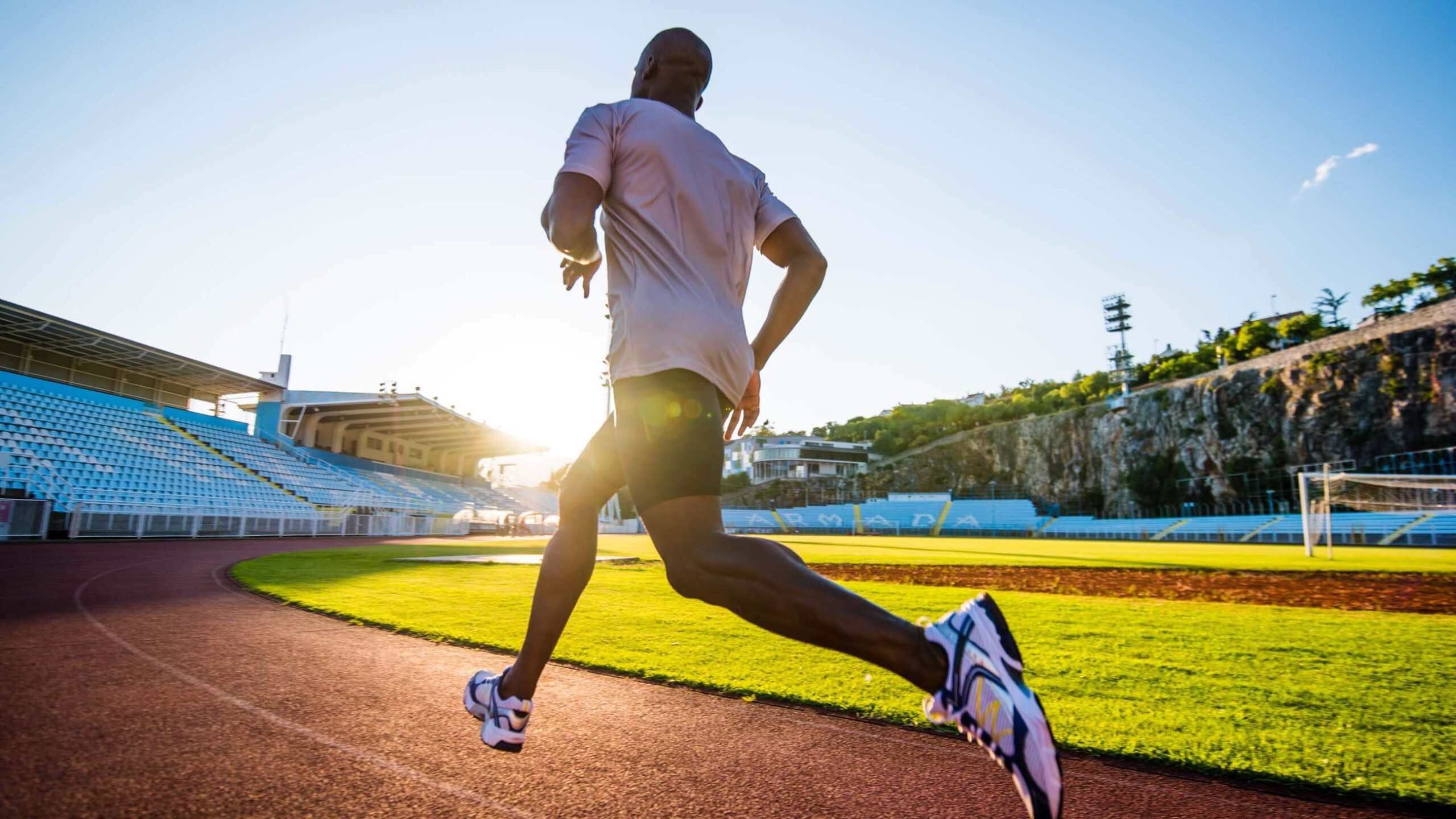 man running on track